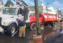 Lluvia provoca trabajos de limpieza en avenida Juárez, San Mateo Atenco Lluvia provoca trabajos de limpieza
